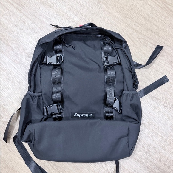 Supreme Other - Supreme Black Utility Backpack with Buckle Straps